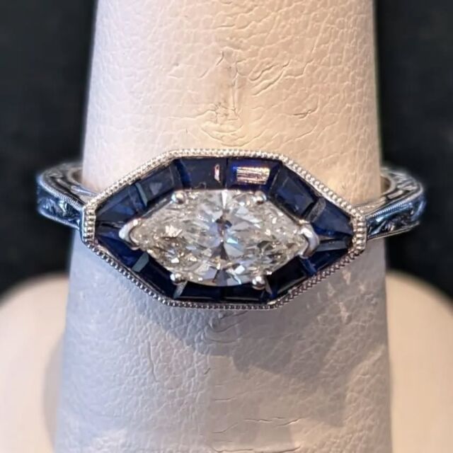 Beautiful 14 kt white gold with center natural approx. 3/4 ct Marquise diamond and natural blue sapphires. Call or stop by today, and Find A Treasure, Save A Fortune! https://metrobrokerjewelers.com #pikesville #pikesvillemd #metrobrokerjewelers #metrobroker #mbj  #jewelry #antiquestylejewelry #sapphirering #diamondjewelry