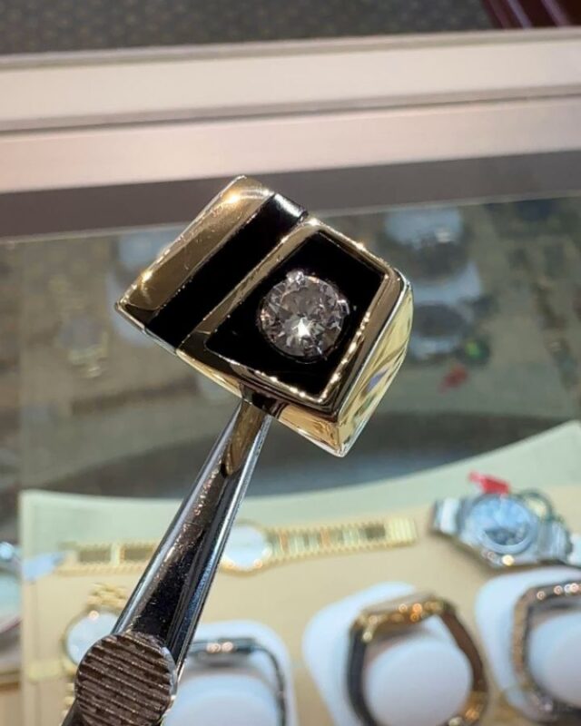 This repair job is worthy of a permanent spot on the grid 😍 Our client came to us with this gent's ring that was in pretty bad shape. He'd lost all of the black enamel on the ring from decades of wear, and wanted our opinion on how best to bring it back to life. We explored enameling options, but we ultimately settled on custom cut onyx to fill in the empty channels in the ring. Swipe to see the before pictures. Safe to say our client left our store smiling ear to ear ♥️ 
Our repair and restoration work is second to none. We have access to the best bench jewelers and stone setters around, and no project is too big or too small for us.

Metro Broker Jewelers - Find A Treasure, Save A Fortune 💎
Stop in today or call us for pricing and availability 📱
410-653-5880

#customjewelry #antiquejewelry #vintagejewelry #estatejewelry #estatejewelryforsale #diamondrings #engagementrings #naturaldiamonds #labgrowndiamonds #baltimorejeweler #jewelryrepair #jewelrydesign #metrobrokerjewelers #metrobroker #metrobrokerltd #mbj #pikesville #reisterstown #beforeandafter